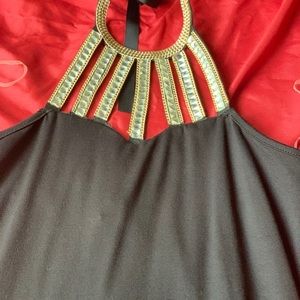 black dress with stone details on the front